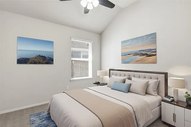 a bedroom with bed and window