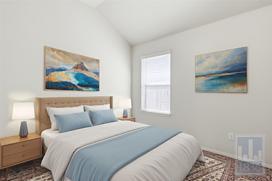7615 Europa Avenue, Unit 139 Round Rock, TX 78665 - Photo 31 of 40 a bedroom with a bed and a painting on the wall