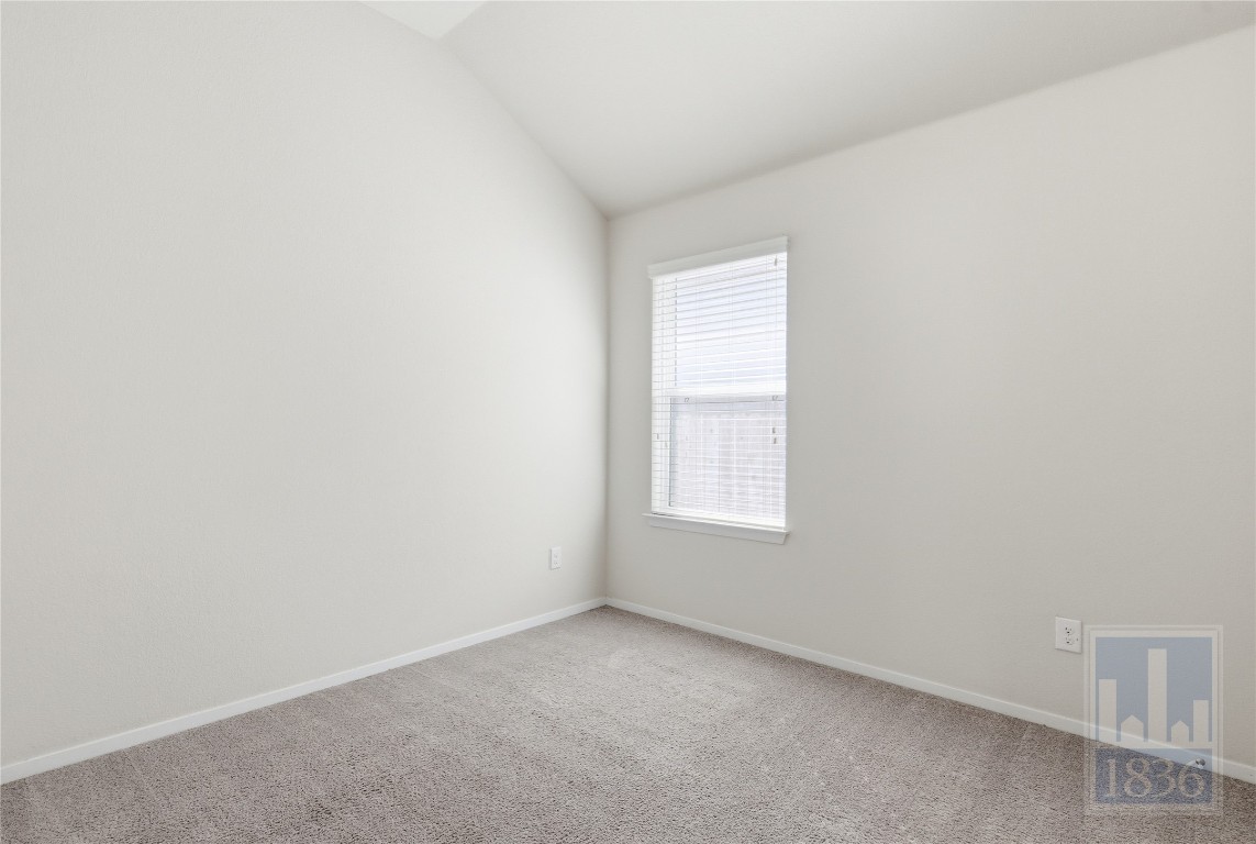 7615 Europa Avenue, Unit 139 Round Rock, TX 78665 - Photo 32 of 40 an empty room with a window