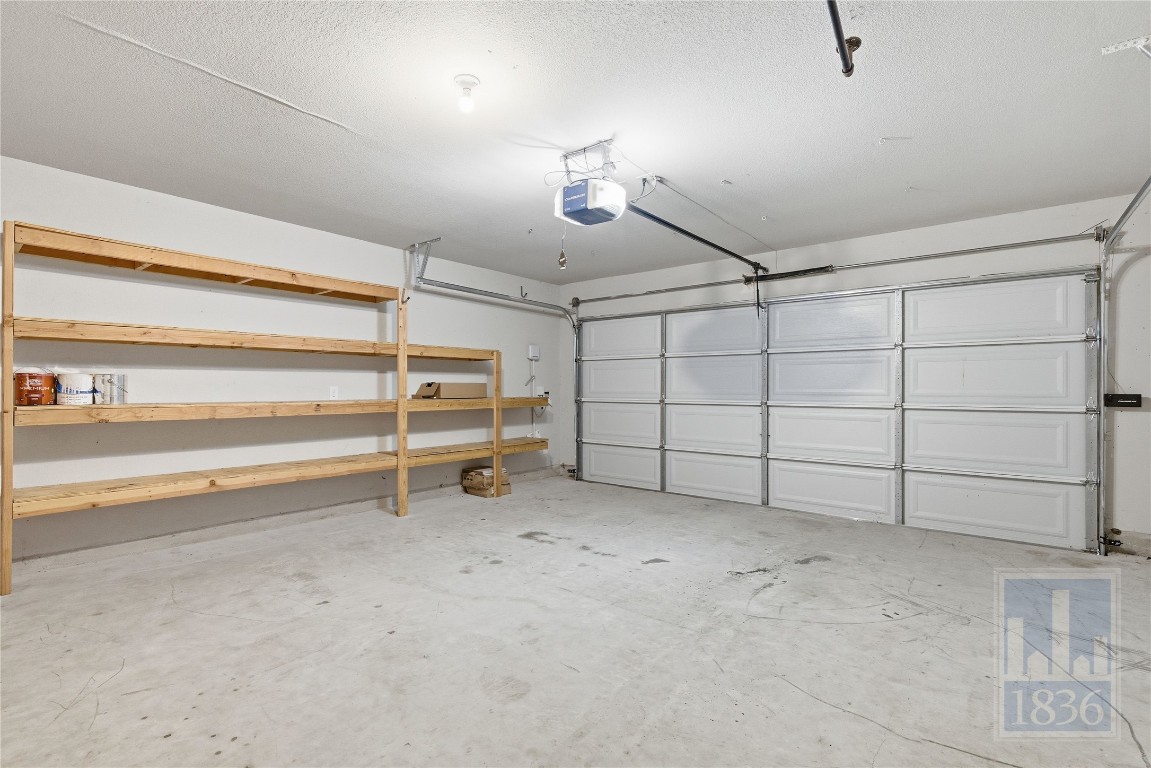 7615 Europa Avenue, Unit 139 Round Rock, TX 78665 - Photo 34 of 40 a view of a garage room