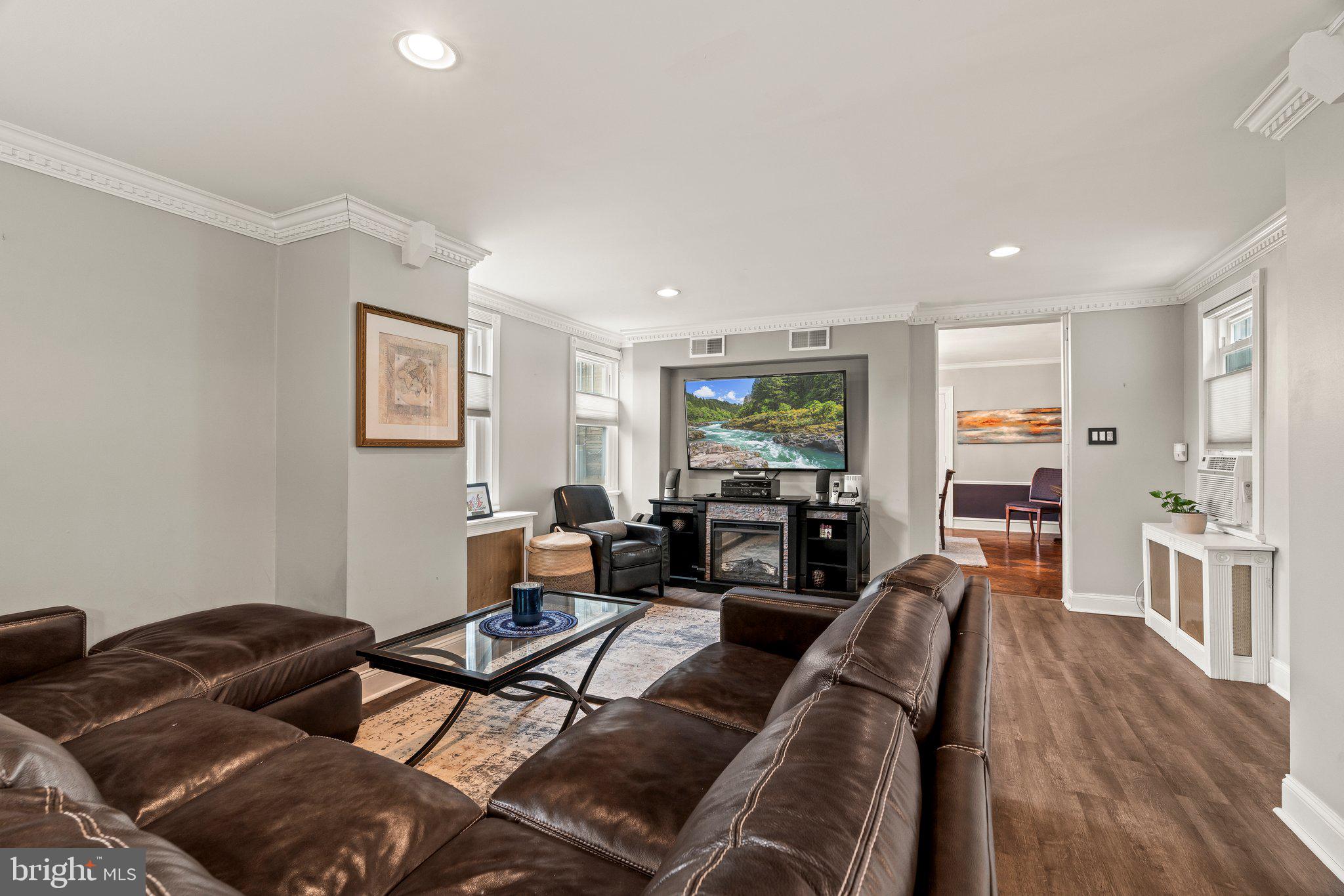 2515 Garrett Road Drexel Hill, PA 19026 - Photo 16 of 61 a living room with furniture and a flat screen tv