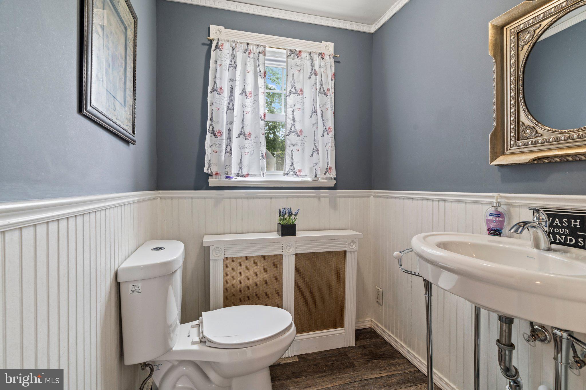 2515 Garrett Road Drexel Hill, PA 19026 - Photo 20 of 61 a bathroom with a toilet a sink and a window