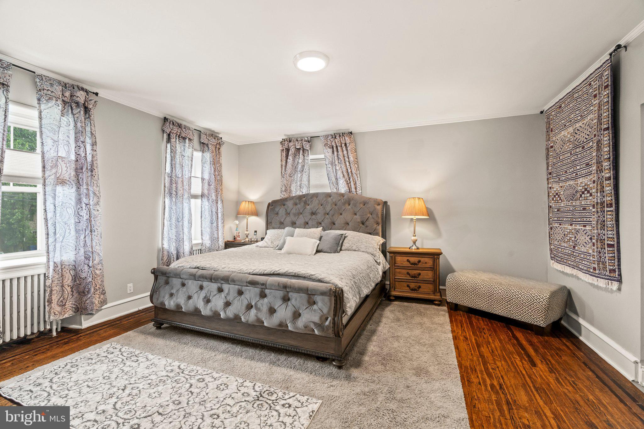 2515 Garrett Road Drexel Hill, PA 19026 - Photo 29 of 61 a bedroom with a bed and wooden floor