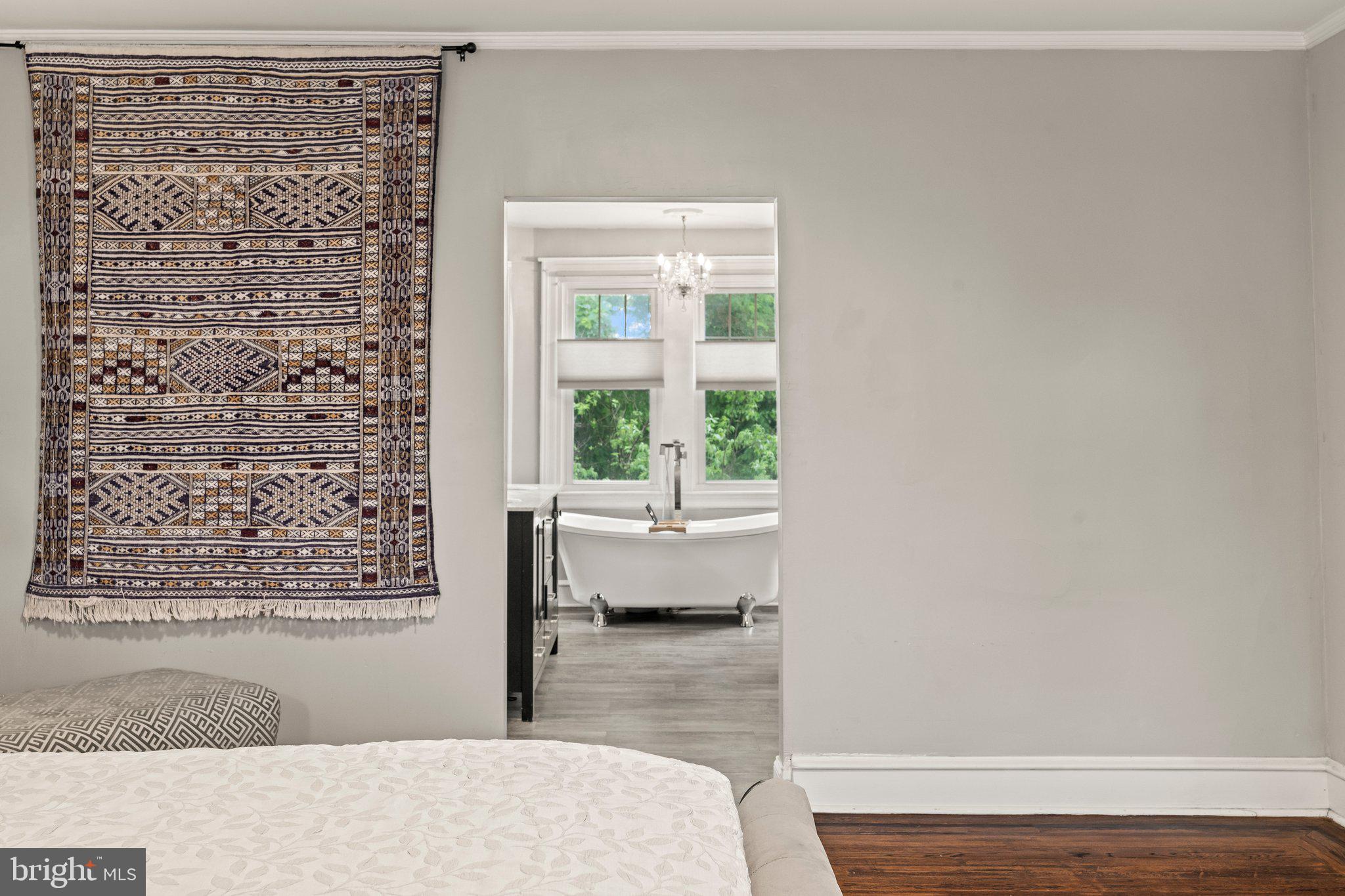 2515 Garrett Road Drexel Hill, PA 19026 - Photo 30 of 61 a view of a bedroom with wooden floor and a window