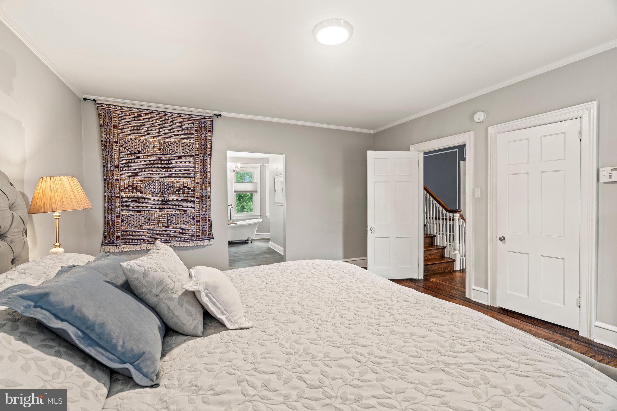 2515 Garrett Road Drexel Hill, PA 19026 - Photo 31 of 61 a bedroom with a bed bathroom and a window