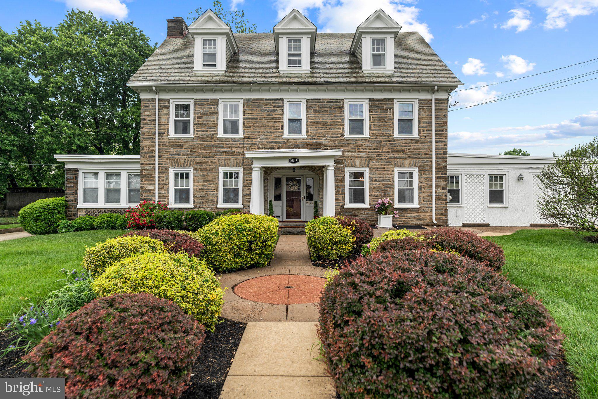 2515 Garrett Road Drexel Hill, PA 19026 - Photo 4 of 61 a front view of a house with garden