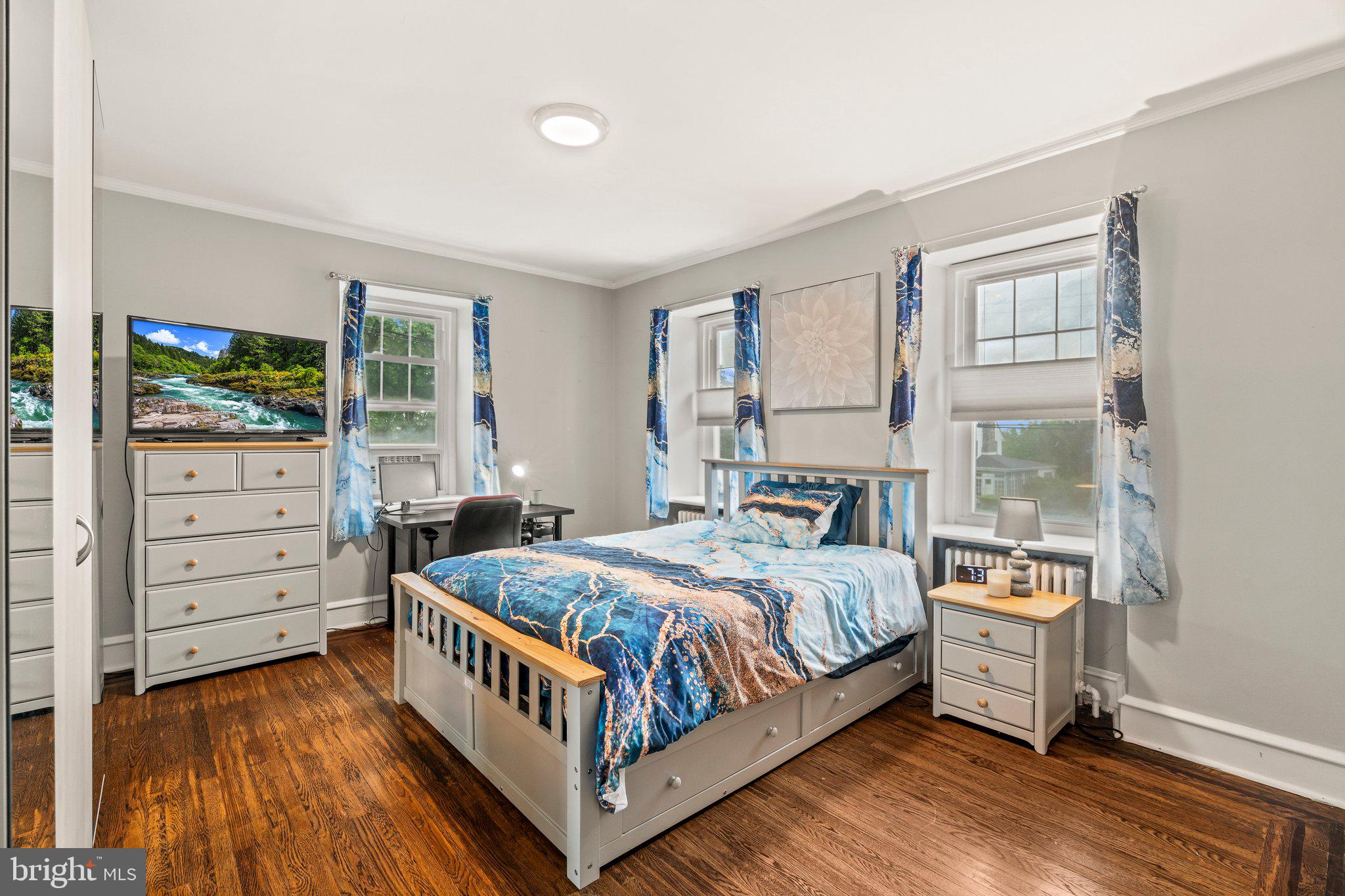 2515 Garrett Road Drexel Hill, PA 19026 - Photo 42 of 61 a bedroom with a bed and wooden floor