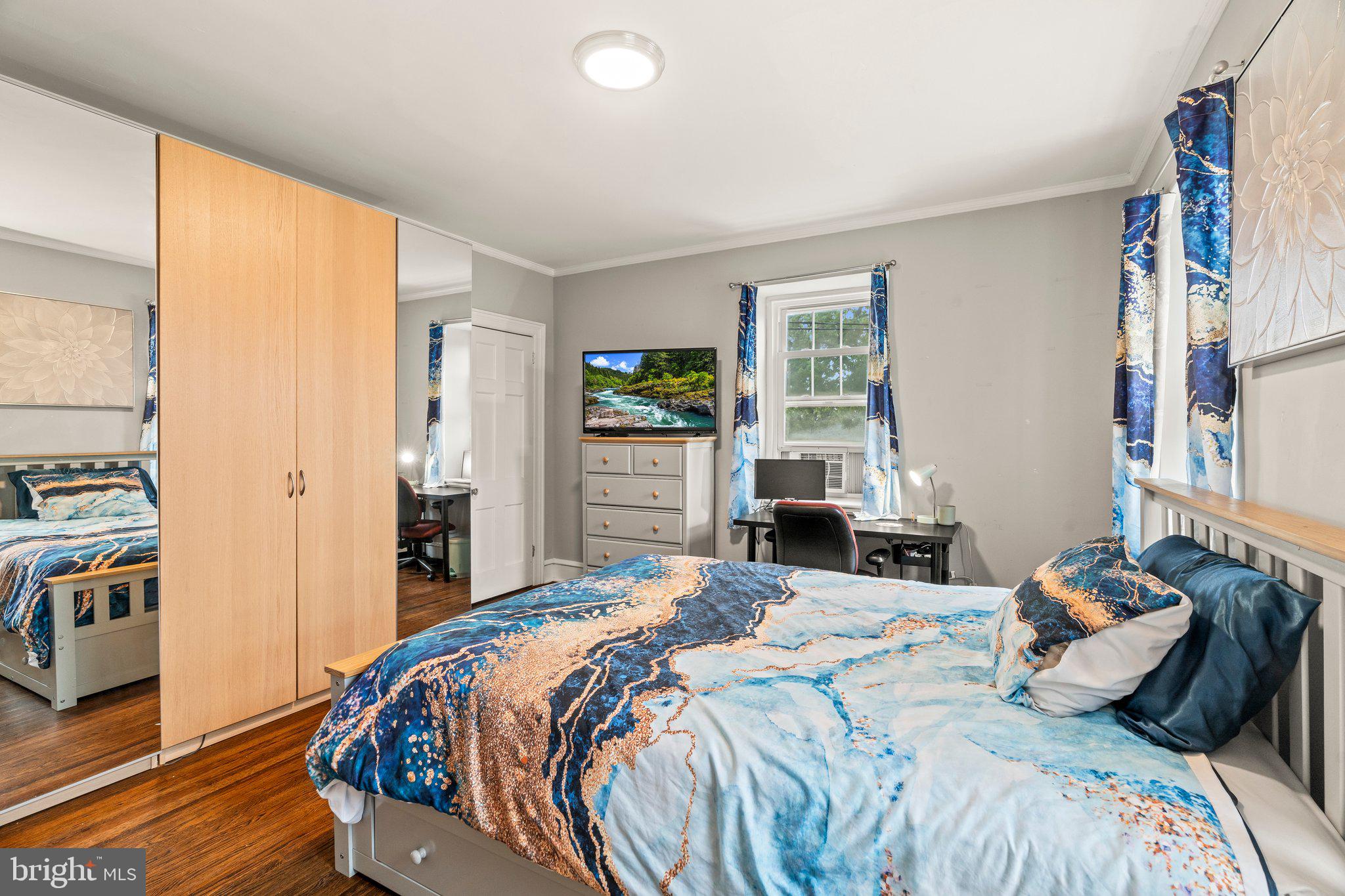 2515 Garrett Road Drexel Hill, PA 19026 - Photo 43 of 61 a bedroom with a bed and wooden floor