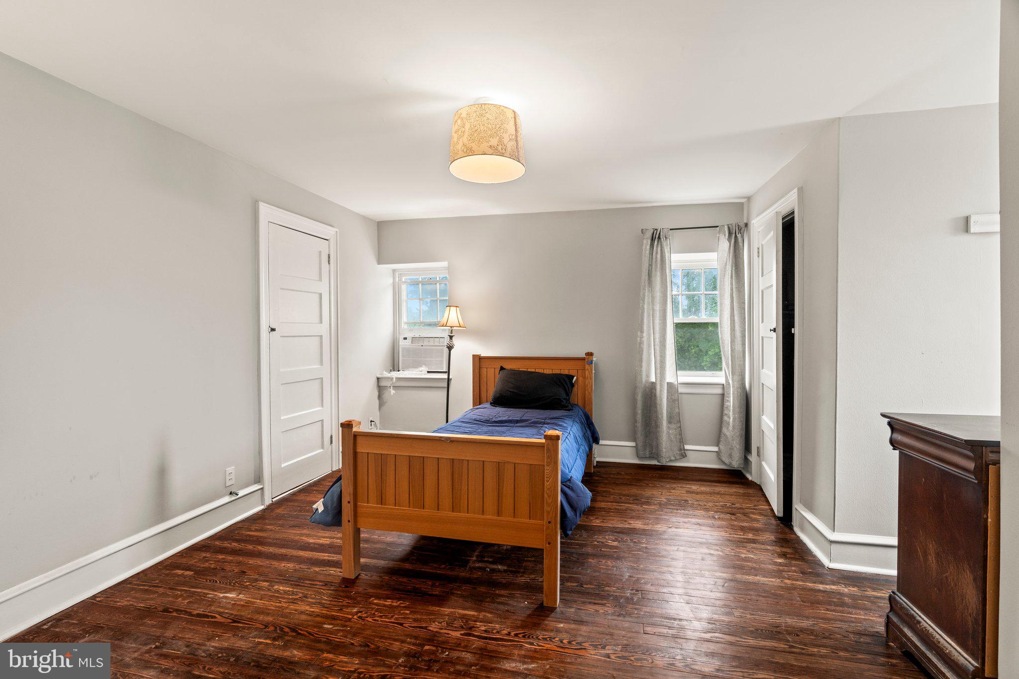 2515 Garrett Road Drexel Hill, PA 19026 - Photo 46 of 61 a bedroom with a bed and wooden floor
