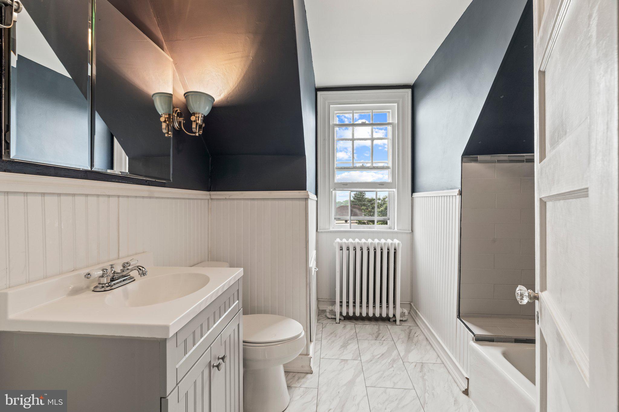 2515 Garrett Road Drexel Hill, PA 19026 - Photo 47 of 61 a bathroom with a sink toilet and mirror