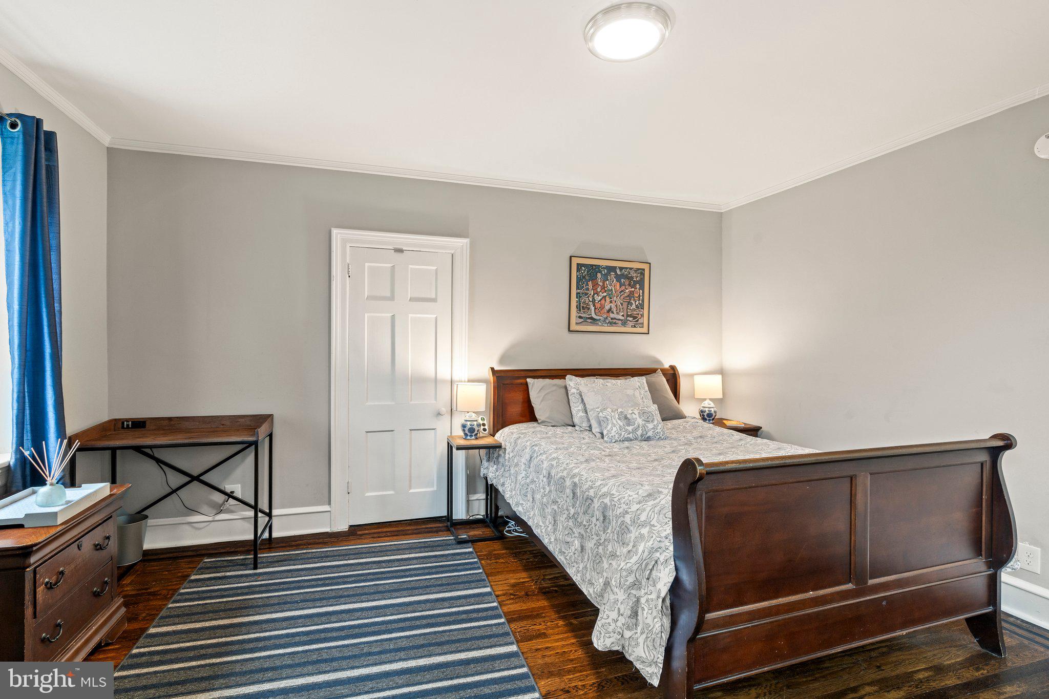 2515 Garrett Road Drexel Hill, PA 19026 - Photo 49 of 61 a bedroom with a bed and wooden floor