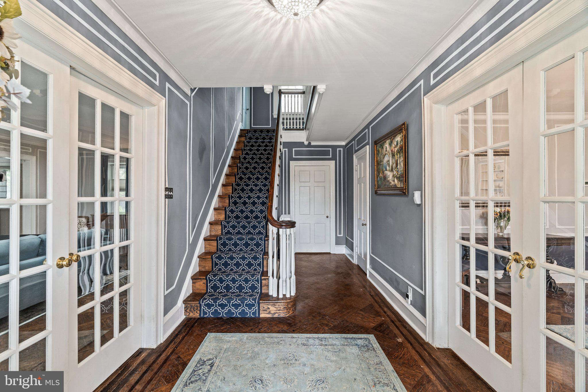2515 Garrett Road Drexel Hill, PA 19026 - Photo 5 of 61 a view of an entryway with wooden floor and a livingroom