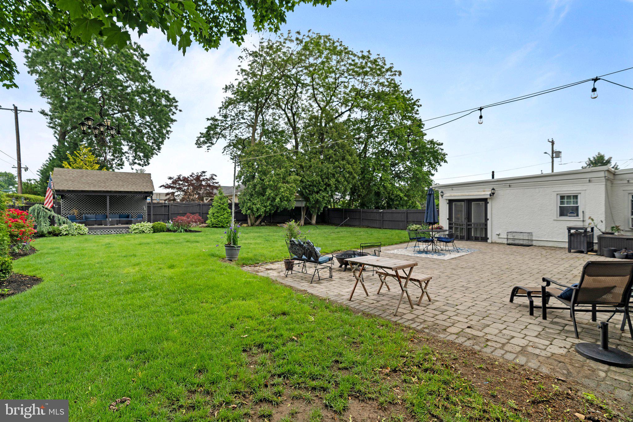 2515 Garrett Road Drexel Hill, PA 19026 - Photo 55 of 61 a view of a house with backyard sitting area and garden