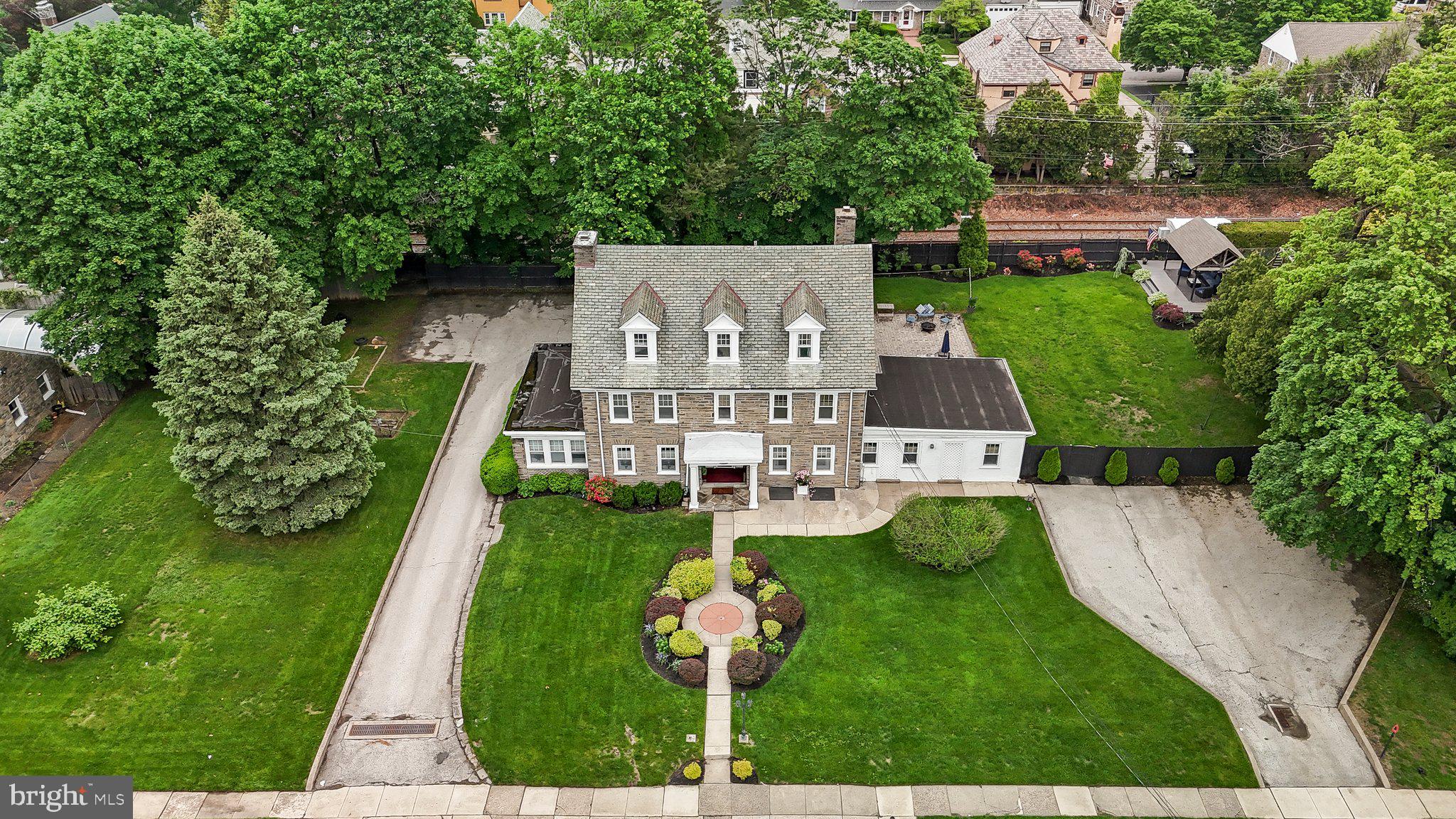 2515 Garrett Road Drexel Hill, PA 19026 - Photo 60 of 61 an aerial view of a house with pool yard and outdoor seating
