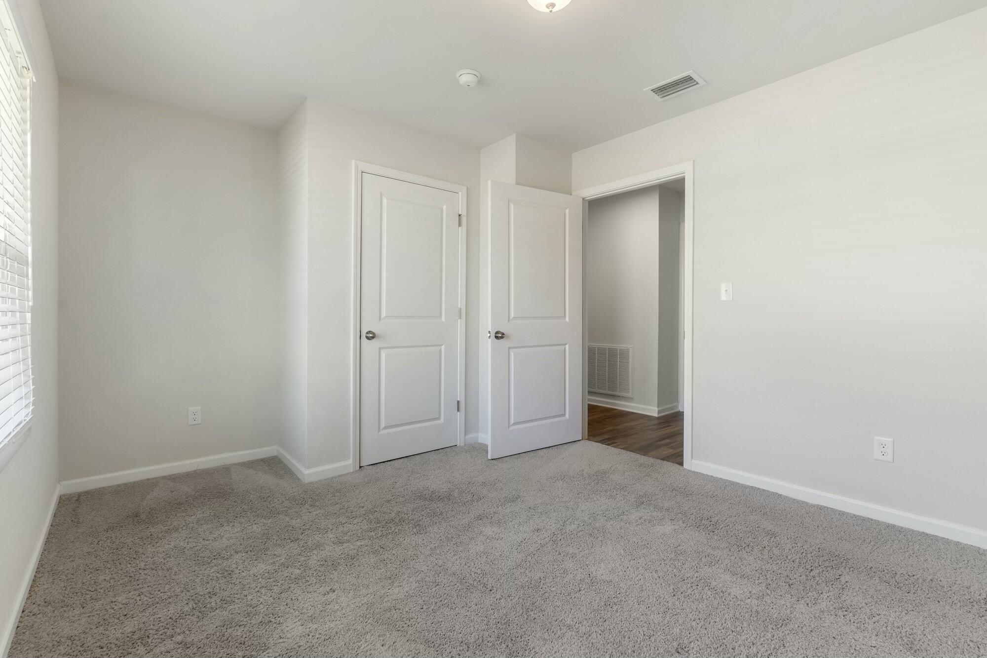 610 Riverwalk Circle Freeport, FL 32439 - Photo 29 of 50 an empty room with closet area