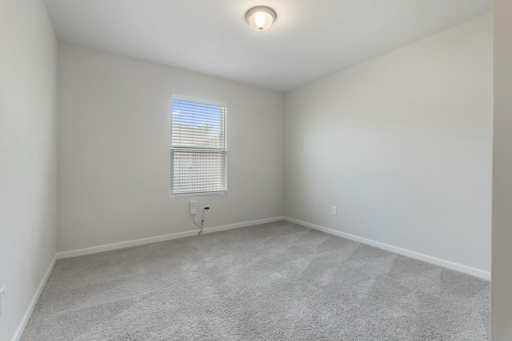 610 Riverwalk Circle Freeport, FL 32439 - Photo 30 of 50 a view of an empty room with a window