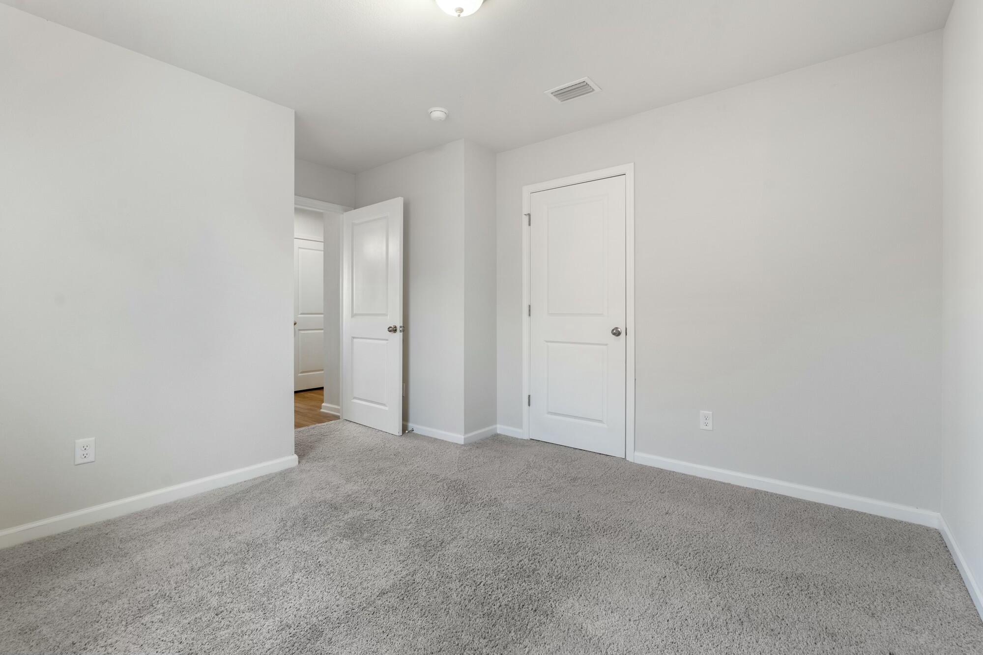 610 Riverwalk Circle Freeport, FL 32439 - Photo 33 of 50 an empty room with an entryway