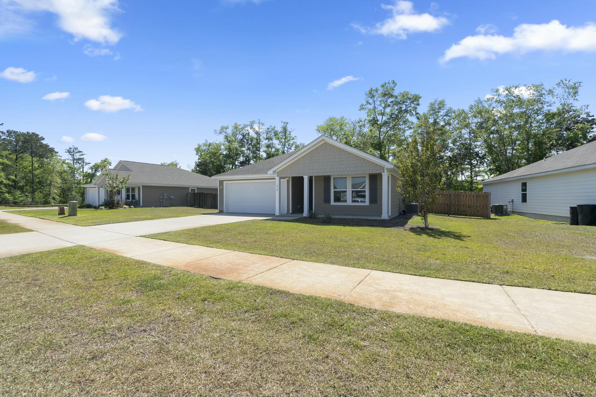 610 Riverwalk Circle Freeport, FL 32439 - Photo 49 of 50 a house view with a outdoor space