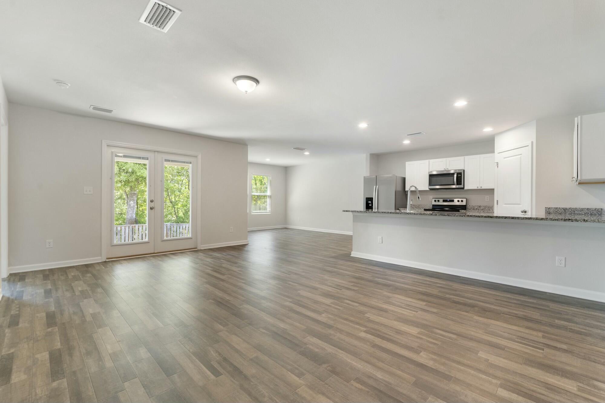 610 Riverwalk Circle Freeport, FL 32439 - Photo 10 of 50 a view of a kitchen with a sink and a window