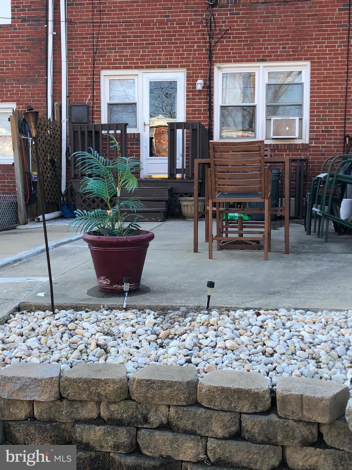 5521 Whitwood Road Baltimore, MD 21206 - Photo 29 of 30 Concrete Patio with Rock Garden