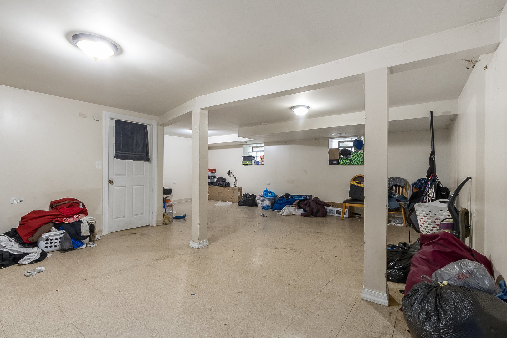 8011 South Ada Street Chicago, IL 60620 - Photo 13 of 15 a view of a livingroom with furniture and a fan