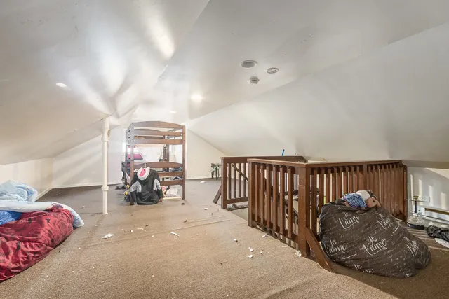 a view of livingroom with furniture and toys