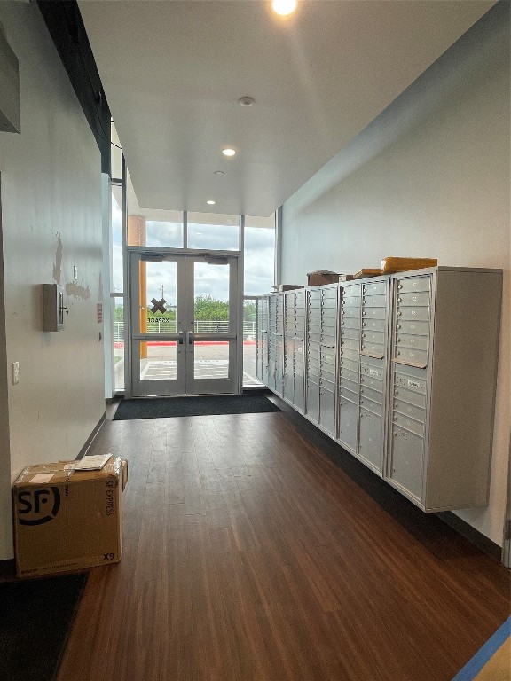 4229 North FM 620, Unit 324 Austin, TX 78734 - Photo 12 of 27 a view of an empty room with wooden floor and a window