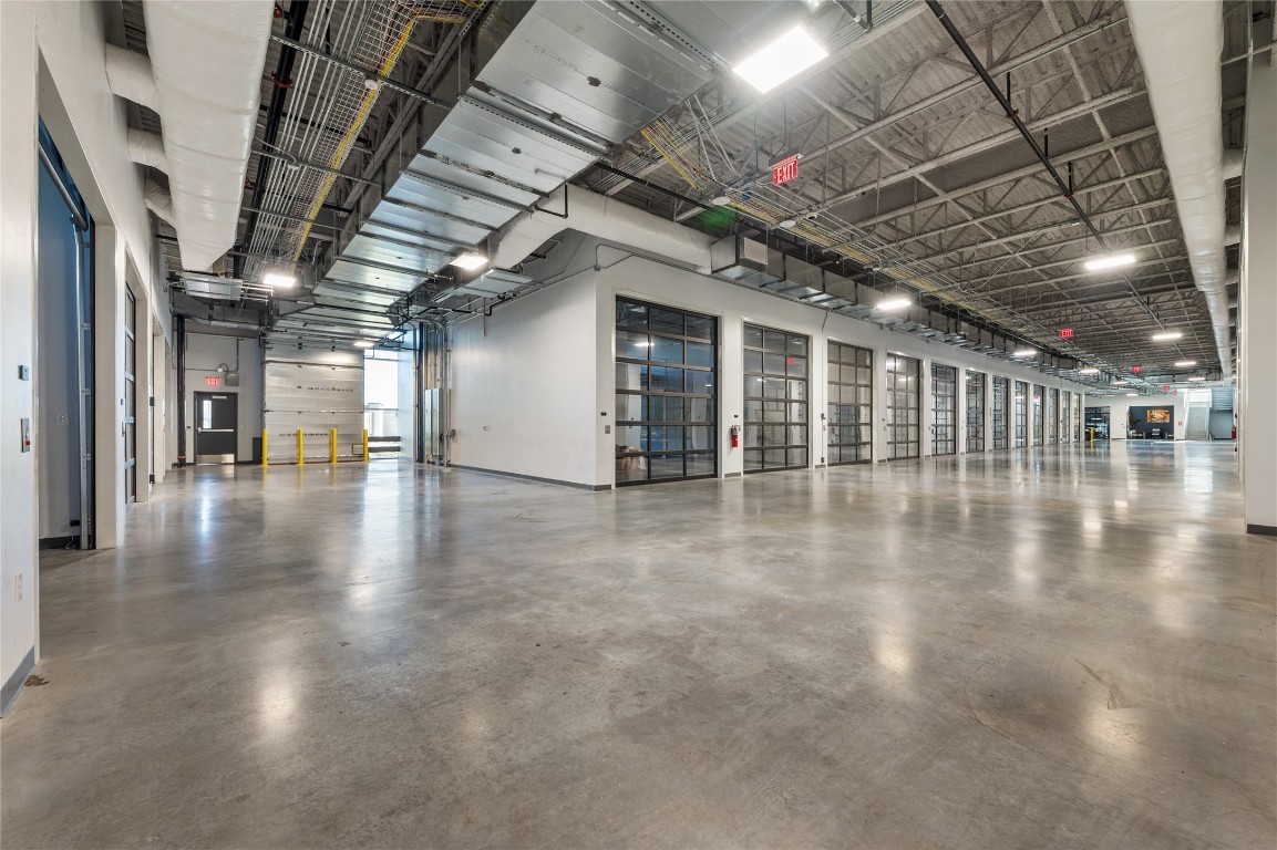 4229 North FM 620, Unit 324 Austin, TX 78734 - Photo 8 of 27 a view of an empty room with wooden floor