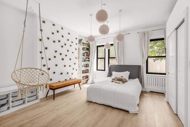 a view of balcony with wooden floor and fence