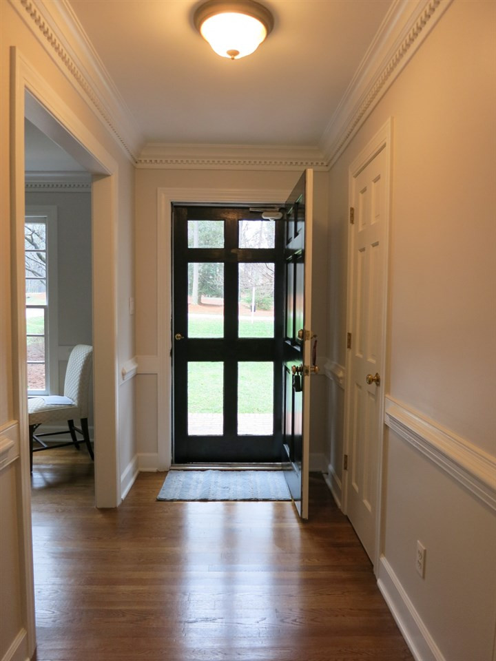 14008 Bingham Drive Raleigh, NC 27614 - Photo 2 of 30 Updates: 2nd flr heat pump 2018, 1st flr heat pump 2011, water htr 2013, roof 2010! Gracious Foyer w/hardwood flr, deep dentil crown molding, chair rail & coat closet. Foyer