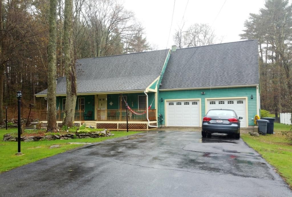 227 Torrey Road Southbridge, MA 01550 - Photo 1 of 30 a car parked in front of a house