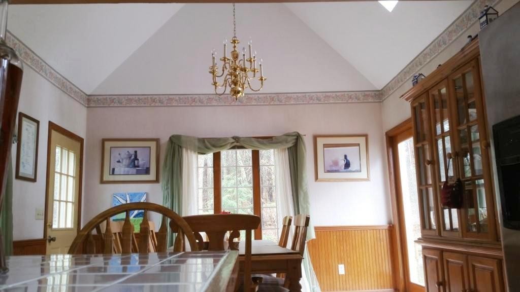 227 Torrey Road Southbridge, MA 01550 - Photo 15 of 30 a view of a dining room with furniture window and wooden floor