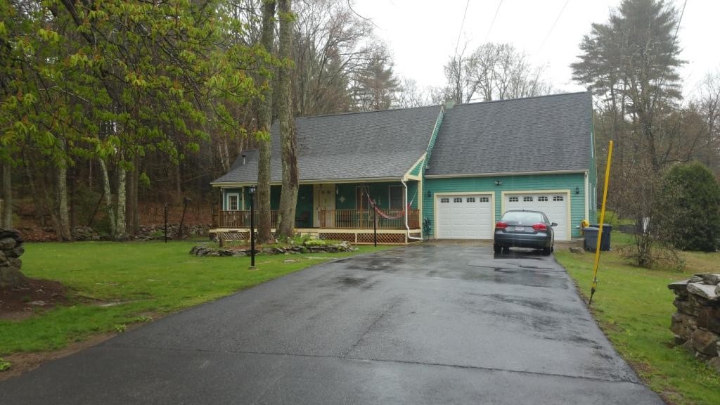 227 Torrey Road Southbridge, MA 01550 - Photo 2 of 30 a view of a house with backyard and garden