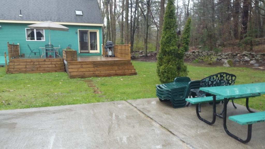 227 Torrey Road Southbridge, MA 01550 - Photo 8 of 30 a view of a chair and table in backyard