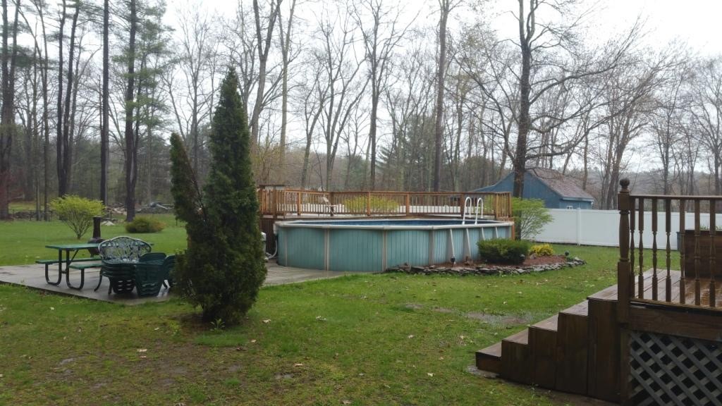 227 Torrey Road Southbridge, MA 01550 - Photo 9 of 30 a view of a house with backyard and sitting area