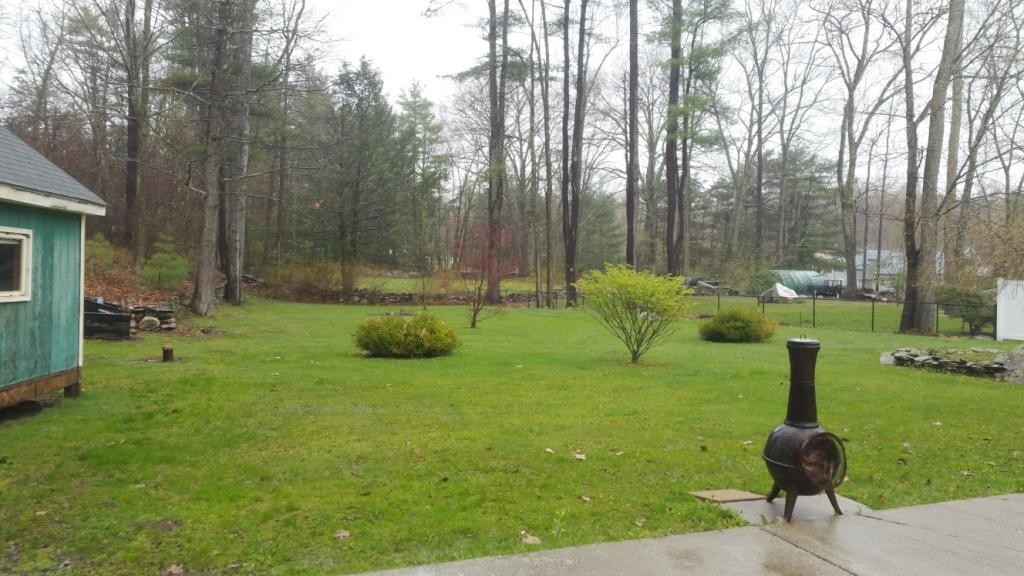 227 Torrey Road Southbridge, MA 01550 - Photo 10 of 30 a view of backyard with green space