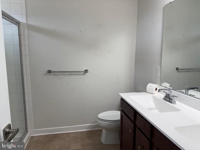 33 Peacock Circle Sewell, NJ 08080 - Photo 12 of 26 a bathroom with a sink a toilet and vanity