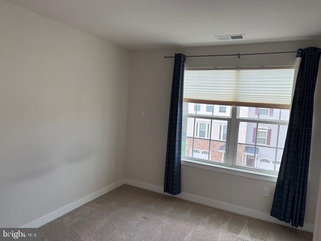 33 Peacock Circle Sewell, NJ 08080 - Photo 15 of 26 a view of an empty room with a window