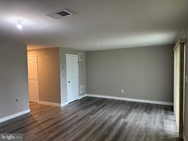 33 Peacock Circle Sewell, NJ 08080 - Photo 21 of 26 an empty room with wooden floor and windows