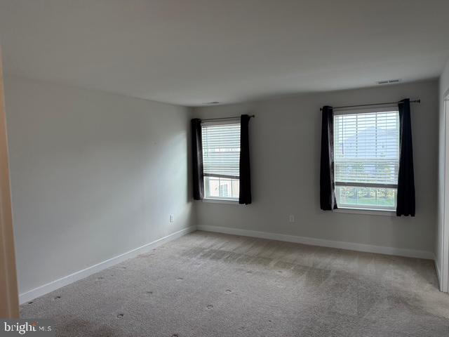 33 Peacock Circle Sewell, NJ 08080 - Photo 9 of 26 an empty room with windows