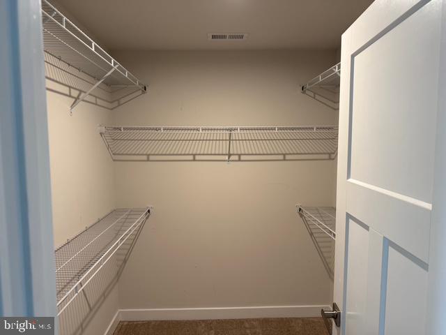 33 Peacock Circle Sewell, NJ 08080 - Photo 10 of 26 a view of a room with racks on the wall