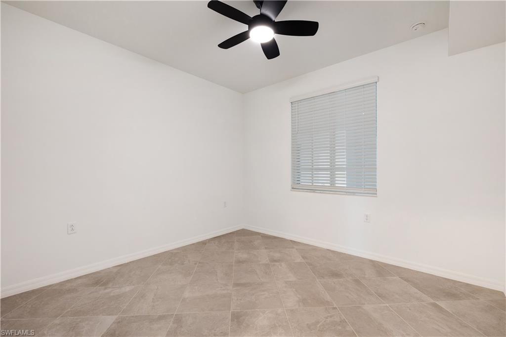 43981 Boardwalk Loop, Unit 2214 Punta Gorda, FL 33982 - Photo 10 of 33 an empty room with a window and a fan