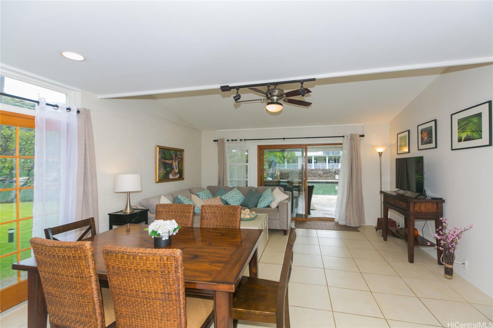 6266 Keōkea Place Honolulu, HI 96825 - Photo 5 of 25 a living room with furniture and a window