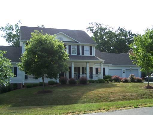 448 Stonehaven Lane Blue Ridge, VA 24064 - Photo 1 of 1 a front view of a house with a garden