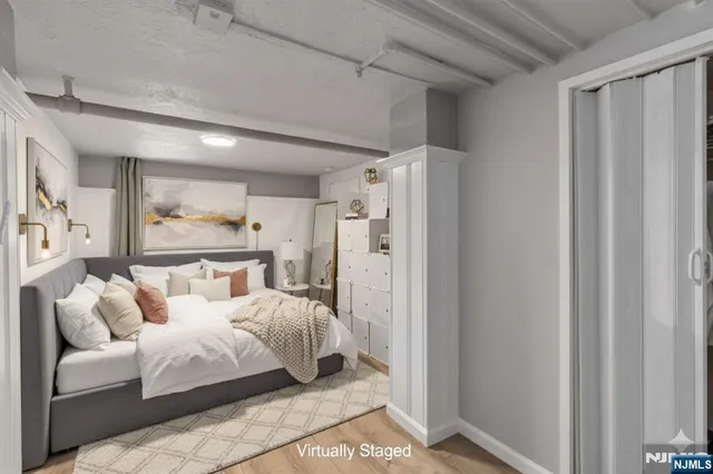 a bed room with a bed and a couch