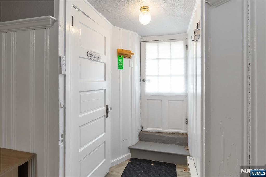 1283 Valley Road, Unit 7 Montclair, NJ 07043 - Photo 4 of 24 a view of entryway with window and hardwood