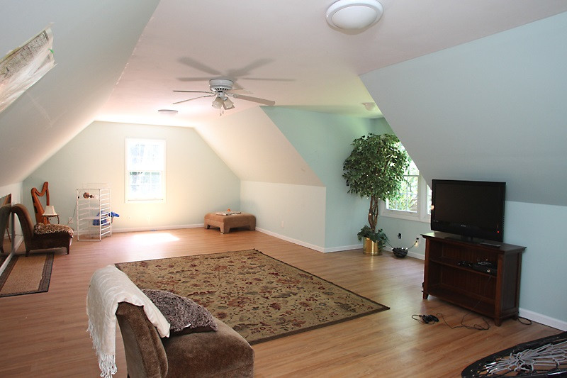 11823 Edgewater Court Raleigh, NC 27614 - Photo 13 of 19 Endless possibilities for this heated/cooled space above the detached two car garage. Bonus Room