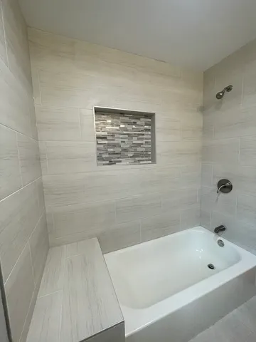 a bathroom with a bathtub