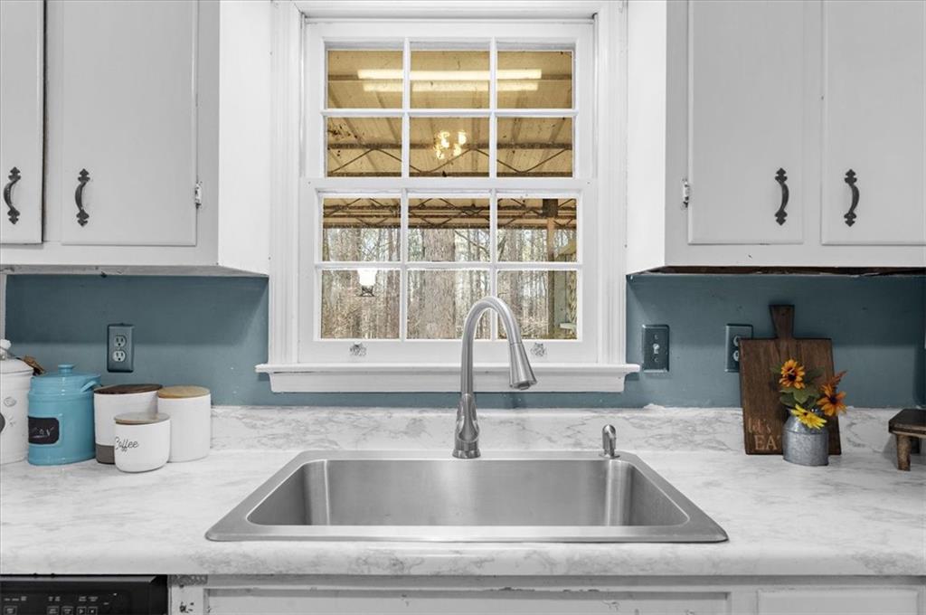 1059 Old Alabama Road Southwest Mableton, GA 30126 - Photo 13 of 33 a kitchen with a sink and a window