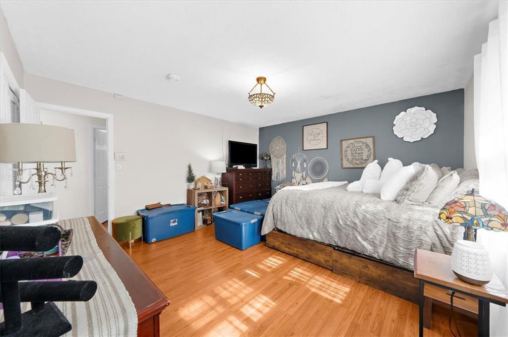 1059 Old Alabama Road Southwest Mableton, GA 30126 - Photo 17 of 33 a bed room with a bed and furniture